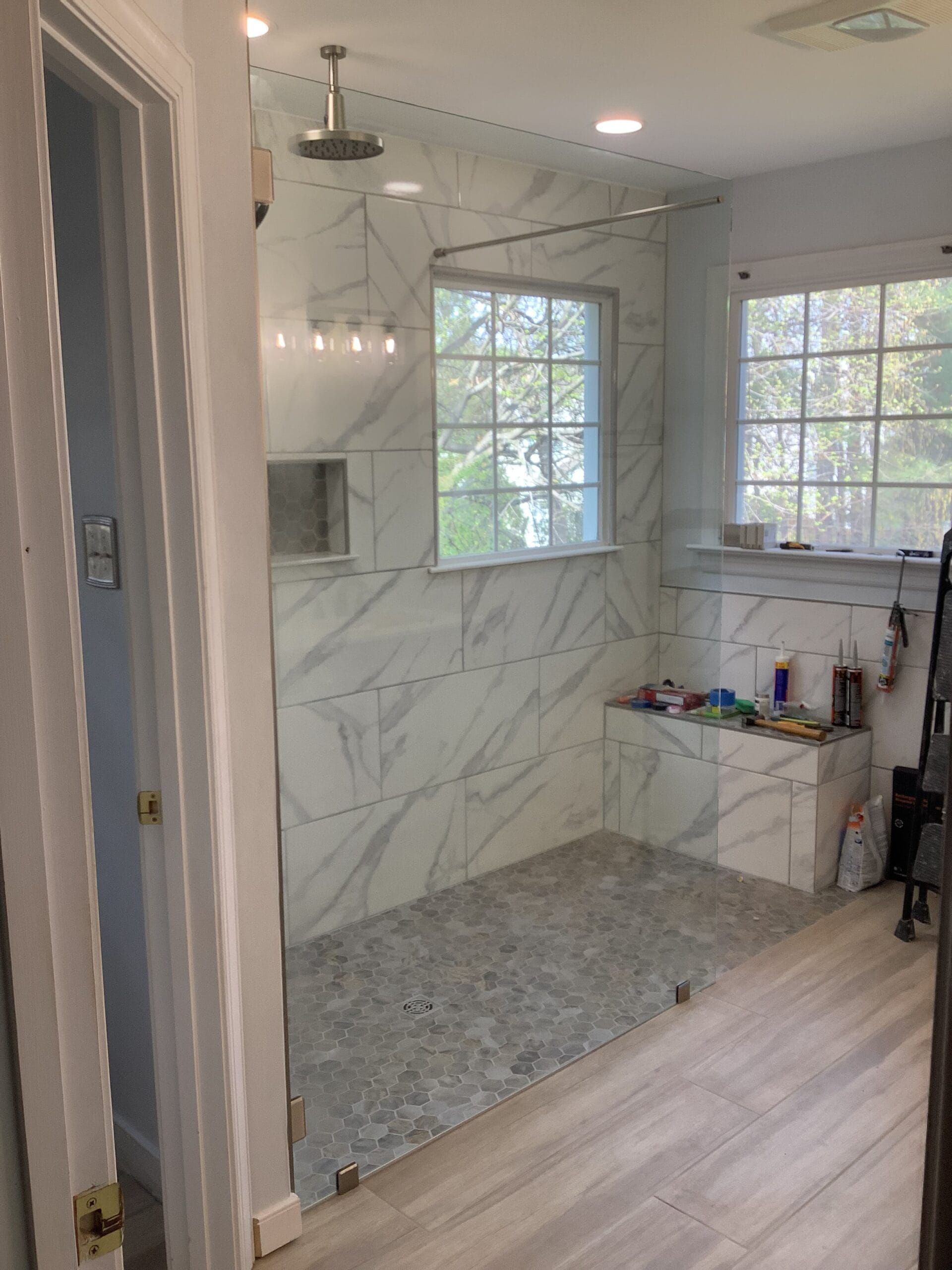 Stationary panel shower door