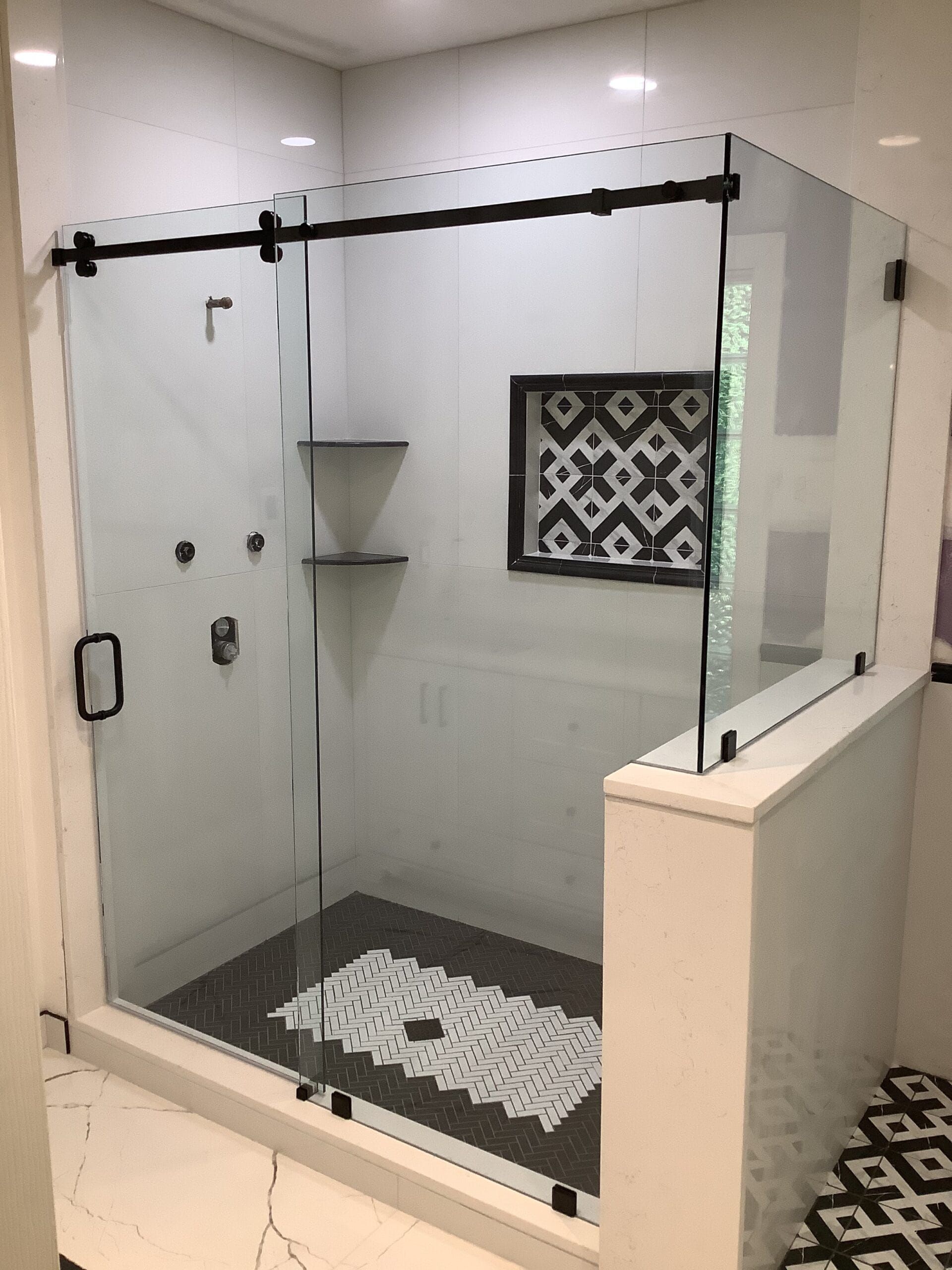 A barn door shower door